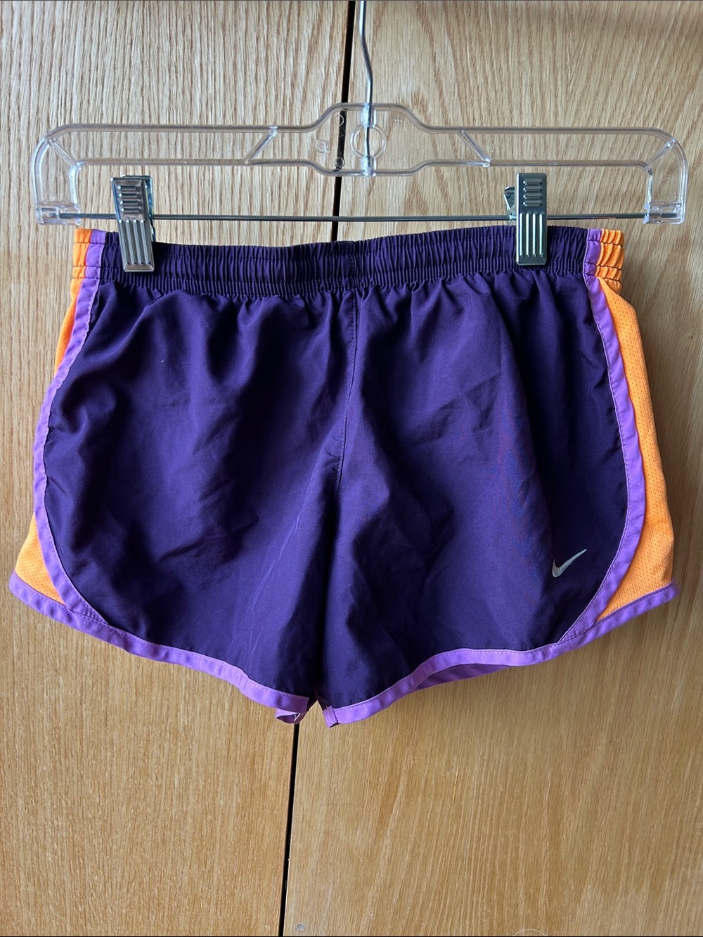 Nike Women's Purple Shorts with Orange Side Panels